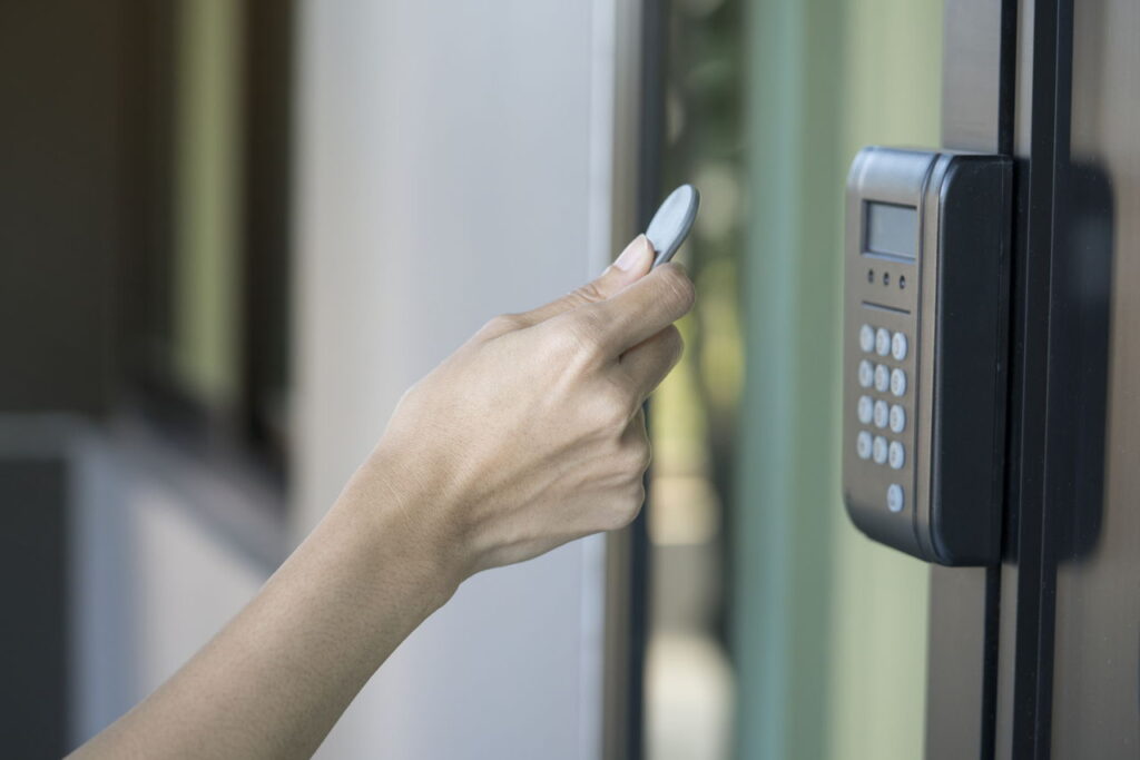 1280 669247036 woman using rfid key to open door