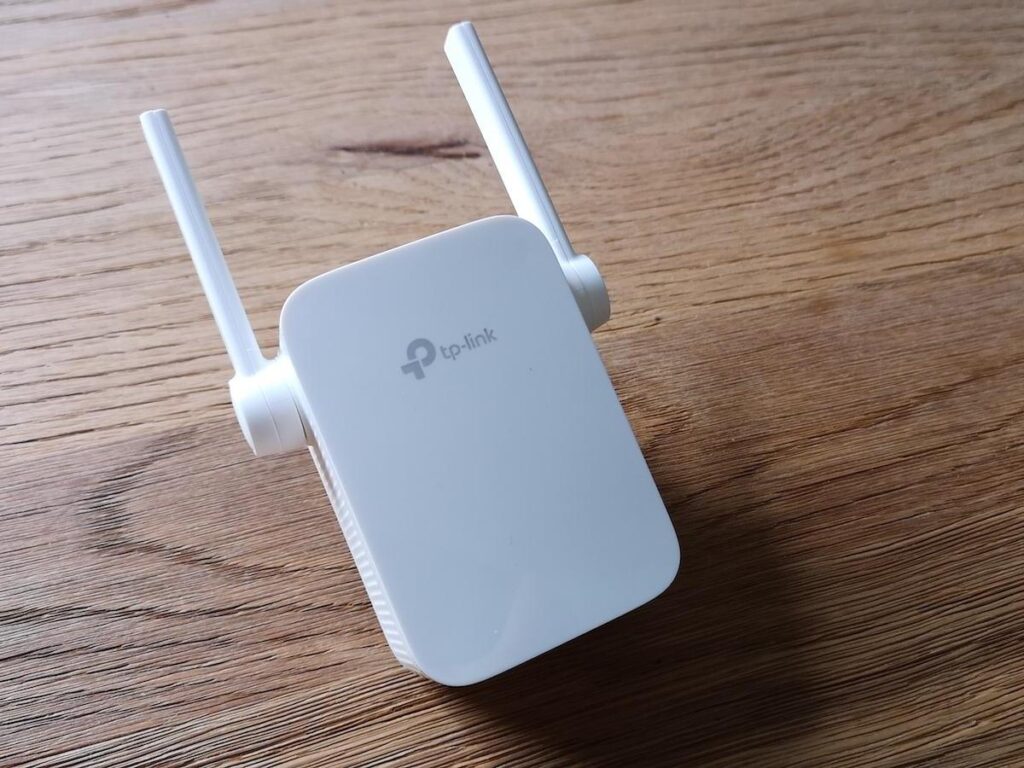 tp link re305 wi fi extender review unplugged thumb1200 4 3